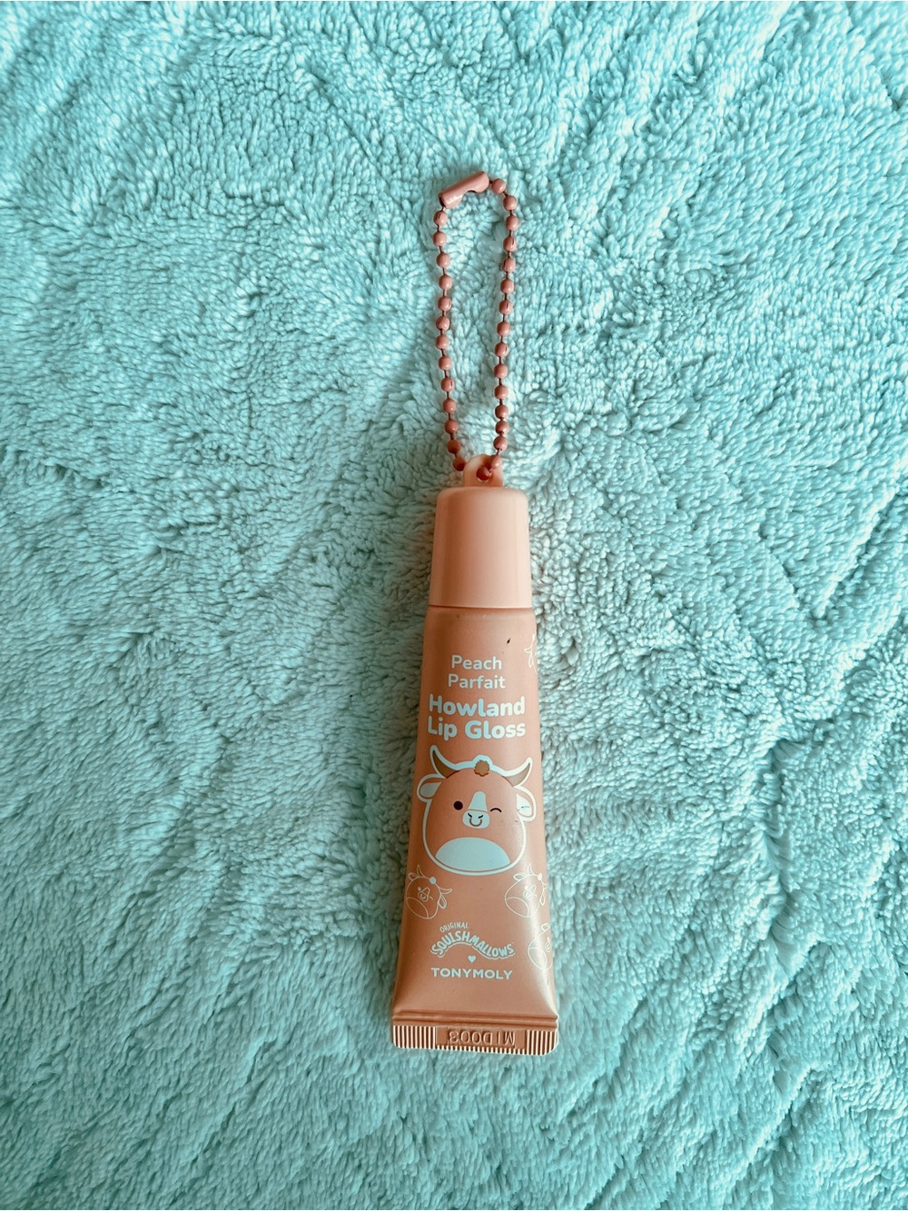 squishmallow x tonymoly howland lip gloss - peach parfait